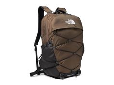 The North Face Borealis - Day Pack Bags : Smokey Brown/TNF Black : Carry all your essentials in The North Face Borealis backpack. 360-degree reflectivity. Articulated shoulder straps. Bottom compression. External bungee-compression system with clips. External fleece-lined pocket. Front compartment features internal organization with secure-zip pockets and a padded tablet sleeve. Large main compartment. Protective laptop compartment. Padded top grab handle. Recycled body fabric with non-PFC durab Borealis Backpack Aesthetic, The North Face Sports Backpack, The North Face Nylon Backpack With Adjustable Strap, The North Face Nylon Hiking Bag, The North Face Backpack With Adjustable Strap In Nylon, The North Face Nylon Standard Backpack, The North Face Backpack For Camping, The North Face Standard Backpack For Camping, Functional The North Face Backpack For Outdoor