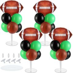 four footballs and balloons are on top of each other