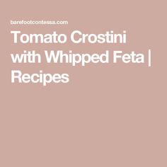 the words tomato crostini with whipped feta recipes are in white font on a pink