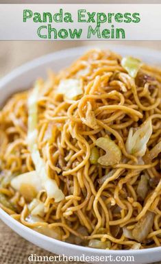 a white bowl filled with noodles and vegetables