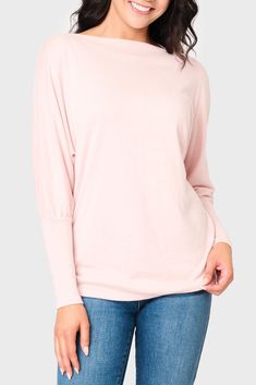 This sweater knit top is the epitome of relaxed style. With its eased fit and slouchy/off-shoulder design, it exudes effortless charm. The long sleeves feature high cuffs, adding a touch of sophistication. Made from super soft fabric, it offers both comfort and a luxurious feel. 50% Rayon | 28% Polyester | 22% Nylon Hand Wash Cold, Dry Flat Length 25 1/2" (size small) Drape Wide Neck Long Dolman Sleeve Eased Fit Easy 30-Day Returns & Exchanges Sabrina is 5'7 and wearing XS Taylor Jackson, Open Neck, Summer Party Dress, Shoulder Design, Sweater Knit, Pink Sweater, Relaxed Style, Dolman Sleeve, Boat Neck