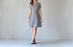 This Charcoal Gray Pullover short sleeved dress is made of a beautiful textured cotton/poly blend knit.   It is a simple dress featuring a crewneck designed to present a great fit that tastefully cinches the waist and falls just above the knee in an A-line Cut.   Make this dress your new go to! Wear to the office, out to dinner or events.   AND it washes well, no dry cleaner needed Small - Bust 32-34, Waist 25-27, Hips 33-36 Medium - Bust 36-38, Waist 28-30, Hips 38-42 Large - Bust 40-42, Waist Clothes For Women Summer, Casual Clothes For Women, Summer Clothes For Women, Dresses Office, Short Sleeved Dress, Crewneck Design, Business Casual Dresses, Simple Dress, Aline Dress