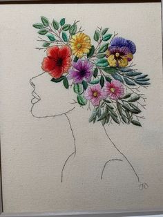 a drawing of a woman with flowers in her hair