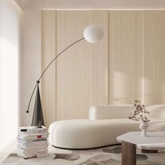 a modern living room with white furniture and wood paneling