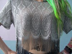 This is a mix between Moesha and the Great Gatsby. The perfect 90s millennial top for New Years Eve. Welcome the new year in with an old school tinsel-town vibe. Silver tassel tummy- shower top. Midriff exposed. Bust: 44 in Size 12 : 46% Rayon, 45% Acetate 9% Metallic, Place mesh bag and dry clean only Label : Expose California / Made in the USA 90s Style Festival Tops For Spring, 90s Style Spring Festival Tops, Trendy Fringe Tops For Festival, Fitted 90s Style Festival Tops, Alternative Summer Party Crop Top, Alternative Summer Crop Top For Party, Alternative Style Summer Crop Top For Party, Bohemian Short Sleeve Tops For Party, Bohemian Short Sleeve Party Tops