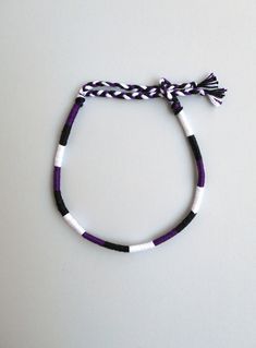 "Friendship anklet, Rope anklet, Black White Purple Surfer gifts, Cotton anklet, Mens anklet, Teenagers gift, Boyfriend gift, Beach anklet Colors used: Black ,White , Dark Purple Material: Cotton thread It is ended with two braids that are tied together to secure the anklet. Width: 0.3 cm / 0.1 \" Other anklets in my shop: https://www.etsy.com/shop/LuckyRatJewellery?section_id=15213457&ref=shopsection_leftnav_1 *Colours may differ slightly from the original due to the configuration of your c Diy Bracelets For Men, Surfer Gifts, Mens Anklet, Rope Anklet, Friendship Bracelets Easy, Ankle Bracelets Diy, Summer Beach Jewelry, Anklet Designs, Gifts For Surfers