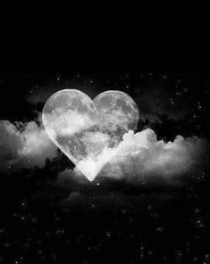 two hearts in the sky with clouds and stars