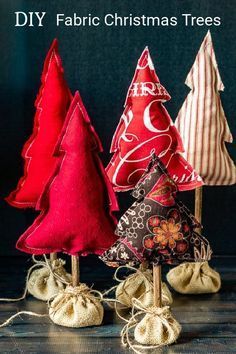 three small christmas trees sitting on top of each other with text overlay that reads diy fabric christmas trees