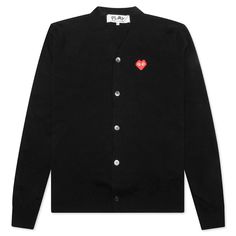 Taking on a wool construction, the Comme des Garcons PLAY x the Artist Invader Cardigan makes an impression. Made in collaboration with the anonymous artist, the silhouette features a full button-down closure paired with ribbed trims. The embroidered pixelated bug-eyed red heart motif at the chest wraps up the remainder of the design. 100% wool Button-down closure Embroidered motif Ribbed trims Style No: AZ-N084-051-1 Designer Black Cardigan For Work, Designer Black Workwear Sweater, Black Cotton Cardigan With Buttons, Designer Fitted Black Cardigan, Designer Wool Cardigan With Button Closure, Designer Black Long Sleeve Cardigan, Designer Black Wool Cardigan, Designer Black Cardigan With Button Closure, Comme Des Garcons Knitwear