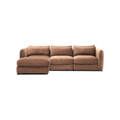 a brown couch sitting on top of a white floor