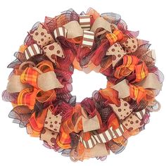 an orange and brown mesh wreath with bows