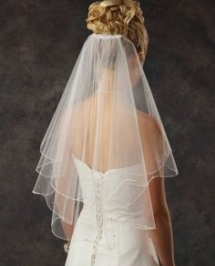 the back of a bride's wedding veil