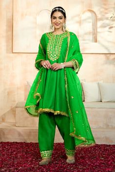 Green short anarkali with floral pattern gota embroidery. Comes with matching salwar and dupatta. - Aza Fashions Chanderi Sets With Gota Work For Eid, Designer Mulmul Palazzo Set With Resham Embroidery, Chanderi Palazzo Set With Dabka Work For Eid, Unstitched Anarkali Sharara With Mirror Work, Unstitched Anarkali Set With Mirror Work For Festive Occasions, Festive Chanderi Palazzo Set With Mirror Work, Anarkali Mulmul Sets For Designer Wear, Anarkali Dola Silk Designer Sets, Pista Green Palazzo Set With Mirror Work For Diwali