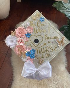 Hi everyone! this graduation cap topper is the perfect addition to your special day! It is made with heavy glitter card stock and permanent vinyl for the text. The paper flowers are all handmade by me and are what make my graduation cap toppers unique and elegant. This cap is made of high quality, durable materials that will keep you sparkling throughout your special day! How to attach to your graduation cap: There are double sided adhesive strips on the back, just peel off the backing and stick Adjustable White Graduation Accessories, Adjustable White Graduation Cap Topper, White Adjustable Graduation Accessories, Personalized Graduation Cap Topper As Graduation Gift, Customizable Graduation Cap Topper As Gift, Customizable Hats For Graduation, Personalized Adjustable Graduation Cap Topper Gift, Grad Cap Ideas, Grad Quotes