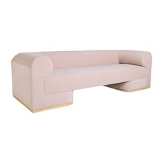 a pink couch with two wooden legs and a curved back rest on an isolated white background