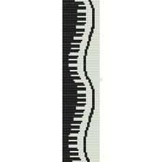 a cross stitch bookmark with piano keys in black and white, on a white background