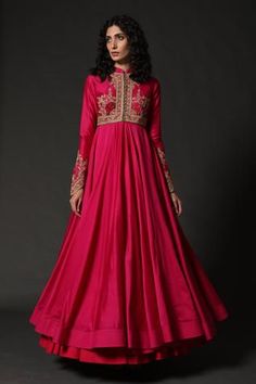 Fuchsia layered anarkali with floral embroidered motifs and front potli placket. Paired with churidar and dupatta.
Component: 3
Pattern: Embroidered
Type Of Work: Floral
Neckline: Mandarin
Sleeve Type: Full Sleeves
Fabric: Chanderi, Lining: Cotton
Color: Pink
Other Details: 
Front potli placket
Floral motifs
Occasion: Sangeet - Aza Fashions Chanderi Anarkali, Desi Dress, Kameez Designs, Traditional Attires, Embroidered Anarkali, Rohit Bal, Pakistani Fancy Dresses, Indian Dresses Traditional, Indian Fashion Designers