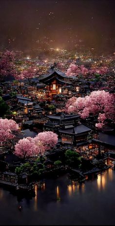 an aerial view of a city with cherry trees in bloom