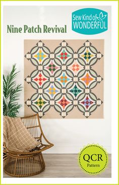 the nine patch revival quilt pattern is displayed on a wall next to a wicker chair