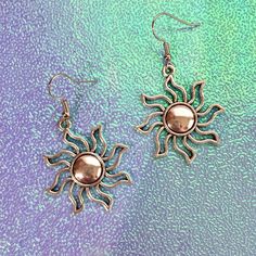 "🌀🌞 Adorable Sun charm earrings! Giving me 90's vibes with the swirling flames ✨ measure at approx 2\" long from hook to bottom of the charm 🌀🌞" Sun Earrings Aesthetic, Retro Summer Festival Jewelry, Summer Festival Retro Jewelry, Retro Dangle Earrings For Festivals, Nickel Free Vintage Summer Jewelry, Nickel-free Vintage Summer Jewelry, Silver Rave Jewelry For Gift, Summer Metal Earrings With Sun Design, Metal Sun Design Earrings For Summer