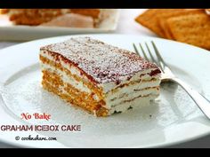 a piece of cake sitting on top of a white plate with a fork next to it