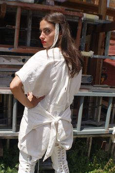 "White Linen Jumpsuit With Avant Garde \"Crying Eyes\" Measurement: waist-28''-30'' ( adjustable), hips-41'', inseam- 28'' Fits size S-L 100% linen Vintage from the early 1990s Revamped by ULTRA-CAT in California" White Fitted Jumpsuit With Tie Back, Fitted White Jumpsuit With Tie Back, Casual Fitted Bottoms With Tie Back, White Belted Jumpsuits And Rompers For Summer, White Belted Jumpsuit For Summer, Summer Cotton Jumpsuits And Rompers With Belt Loops, Fitted Cotton Belted Jumpsuits And Rompers, White Fitted Jumpsuits And Rompers With Tie Waist, Fitted White Jumpsuits And Rompers With Tie Waist