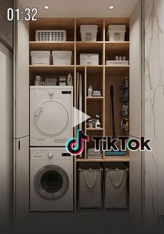 a washer and dryer in a small room next to a shelf with baskets