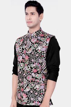 Introducing our exquisite Jade Black and Amethyst Purple Multi-Colour Designer Embroidered Nehru Jacket, a stunning addition to your wardrobe for weddings, engagements, or parties. Crafted with meticulous detail, this Nehru jacket effortlessly blends sophistication with casual charm. Pair it with our Kurta Jacket Set for a complete ensemble. Elevate your style with this timeless piece, tailored for the modern man who appreciates elegance and versatility. In addition to being constructed from Imp Long Sleeve Bandhgala With Floral Embroidery For Parties, Party Long Sleeve Bandhgala With Floral Embroidery, Festive Long Sleeve Embellished Nehru Jacket, Traditional Embellished Nehru Jacket For Festive Season, Traditional Embellished Festive Nehru Jacket, Fitted Nehru Jacket With Intricate Embroidery For Party, Festive Embellished Nehru Jacket For Eid, Multicolor Embroidered Long Sleeve Kurta For Reception, Embellished Long Sleeve Nehru Jacket For Festive Occasions