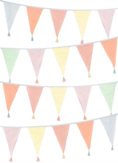 the bunting flags are multicolored and have tassels