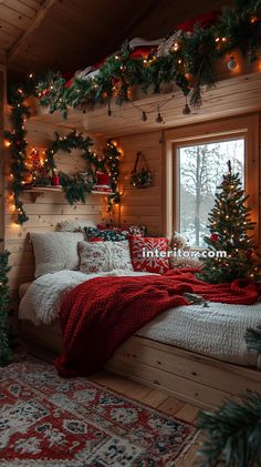 a bedroom decorated for christmas with garlands and lights on the windowsill, bed in foreground