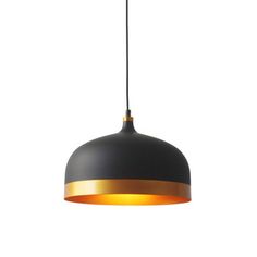 a black and gold pendant light hanging from a ceiling