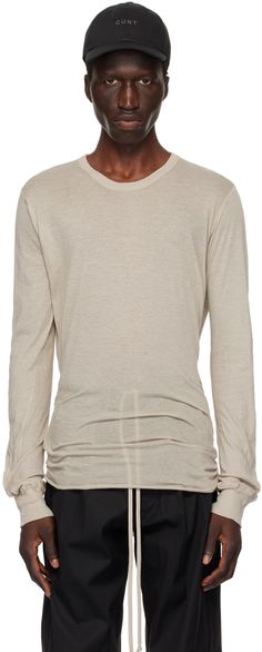 Semi-sheer GOTS-certified organic cotton jersey T-shirt. · Rib knit crewneck · Raw edge at asymmetric hem · Rib knit cuffs · Asymmetric central seam at back Supplier color: Pearl Basic Long Sleeve, Knit Crewneck, Knit Cuff, Rick Owens, Raw Edge, Jersey T Shirt, Asymmetric Hem, Long Sleeve T Shirt, Apparel Accessories