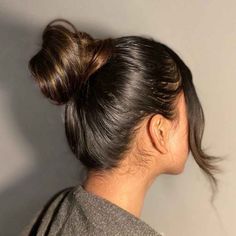 Add some bounce to your space buns with curly hair! Find more ideas on our blog. (allcreditstoowner) Visit blog for more hair inspiration. Sleek Bun