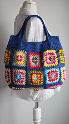 Blue Colorful Crochet Granny Square Shoulder Bag in Calm Beige Color and Vintage Style, the Beige Color Crochet bag is perfect for all day,as Market bag and for Beach using. This Colorful Crochet bag is made by me and it is %100 handmade .  I crochet this shoulder bag with cotton yarn. I sewed the inner lining from cotton fabric. This wonderful bag is big enough for all your belongings 📍the size is approximately   45×38 cm 📍100% handmade  📍Lined with 1 zipper pocket  📍I used Washable cotton/ Granny Square Shoulder Bag, Colorful Granny Square, Boho Market, Square Shoulder Bag, Colorful Crochet, Market Bags, Crochet Granny, Market Bag, Beige Color