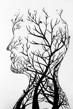 a black and white drawing of a person's head with trees growing out of it