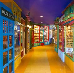 the inside of a toy store filled with lots of toys