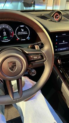 the interior of a modern car with dashboard and infotains on display in a showroom