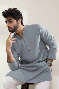 large size Straight Kurta For an elevated daily look opt for textured kurta imbued in a light grey hue. Details: Plain Front, Plain Back, Band Neck, Full Sleeves Colour: Light bluish gray Fabric: Blended Texture Fabric Plain Kurta Pajama Men, Plain Kurtas For Men, Light Colour Kurta For Men, Textured Kurta For Men, Gray Kurta Men, Mens Kurta Colours, Kurta Pajama Colours For Men, Kurta Salwar Men, Kurta Colour For Men