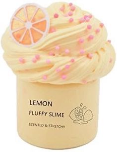 a yellow jar filled with lemon fluffy slime covered in pink sprinkles