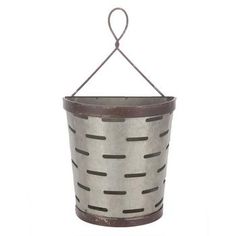 a metal bucket hanging from a rope