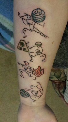 a person's leg with tattoos on it and an image of the same character