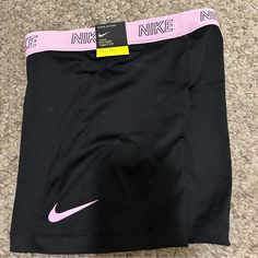 Nike Women Black And Pink Shorts Size: Small Never Worn Nike Black Fitted Athletic Shorts, Nike Fitted Pink Shorts, Fitted Pink Nike Shorts, Nike Pink Fitted Shorts, Pink Nike Fitted Shorts, Nike Black Workout Shorts, Nike Black Training Shorts, Nike Black Athletic Shorts With Built-in Shorts, Women Shorts