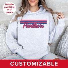 Gear up for game day with this retro-inspired sweatshirt featuring your favorite team mascot customized in the colors of your choice. These designs are intended to have a vintage look; colors are not as vibrant as what you see on your screen. ** SWEATSHIRT FEATURES ** This unisex heavy blend hooded sweatshirt is made with a thick blend of cotton and polyester and is created for comfort. Soft and warm, it's a perfect choice for any cold day. In the front, the spacious kangaroo pocket adds daily p Sports Mascot, Team Sweatshirts, Team Shirt, Spirit Wear, Team Shirts, School Spirit, Hoodie Design, Front Design, Cold Day