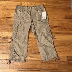 Woman’s Pants . Never Been Worn. Excellent Condition. Light And Comfy. 100% Cotton. Casual Khaki Cotton Capris, Spring Casual Cargo Style Capris, Casual Cropped Leg Cargo Bottoms, Casual Cropped Cargo Style Bottoms, Melina Pants, Coral Pants, Linen Drawstring Pants, Black Capri Pants, Womens Black Pants