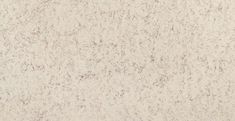 a close up view of a white marble textured wallpaper with brown speckles