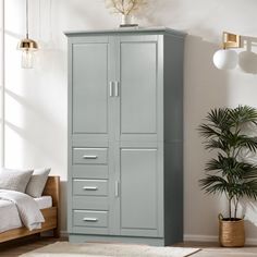 a bedroom with a bed and a tall gray cabinet