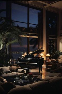 a living room filled with lots of furniture and a grand piano in front of a window