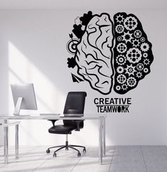 a wall decal with the words creative teamwork and a human brain on it