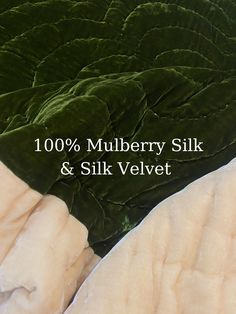 there is a large pile of cabbage next to the bed sheet that says, 100 % mulberry silk & silk velvet