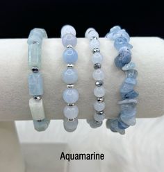 Ready to ship 7 1/4" stretchable bracelet made from Genuine Aquamarine Gemstones, Stainless Steel & Glass Crystals w/ Optional Charm  **One Charm can be changed upon request. I can send pictures of charms I have in stock, just send me a message or note when ordering* --Types Of Charms: Alphabet Letter, Anchor, Animal, Awareness Ribbon, Bird, Birthstone, Bumble Bee, Butterfly, Celtic Knot, Cat, Cross, Crown, Crystal, Dragonfly, Elephant, Evil Eye, Feather, Flower, Hamsa Hand, Heart, Hope Ribbon, Different Types Of Bracelets, Types Of Bracelets, Gem Bracelets, Animal Awareness, Crown Crystal, Hand Heart, Bracelets Design, Feather Flower, Beads Bracelet Design